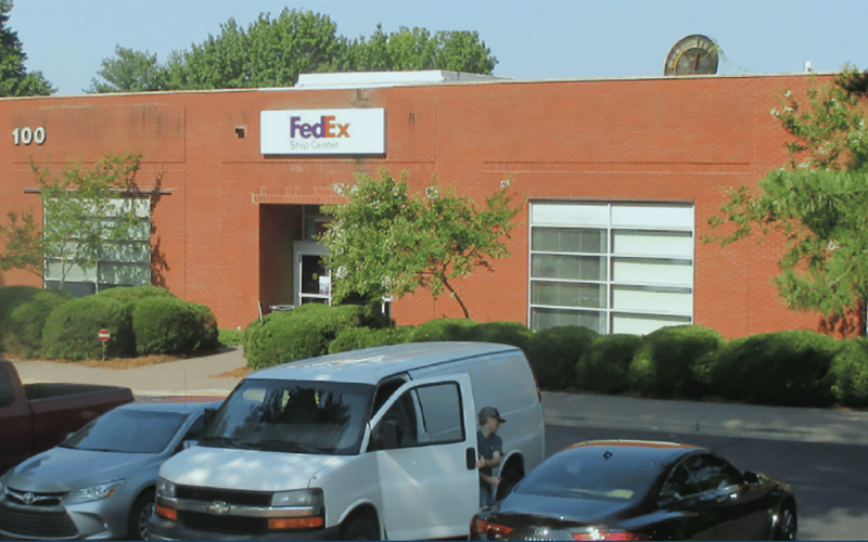 Marketing image of a FedEx Ship Center business front